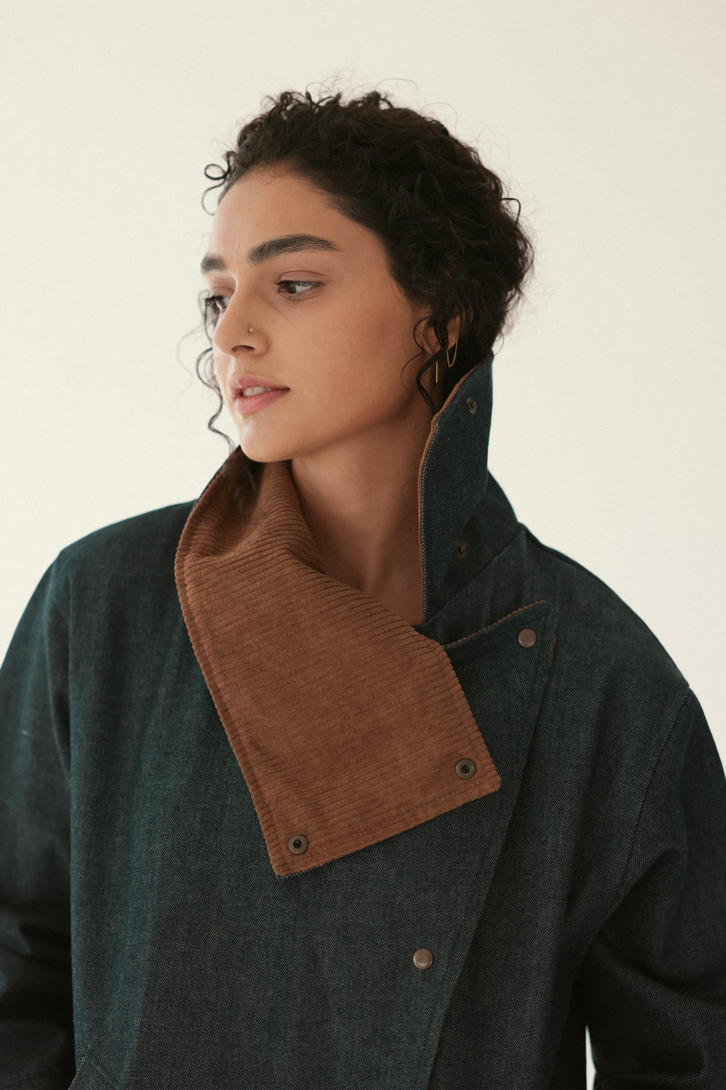 Denim jacket with brown collar detail