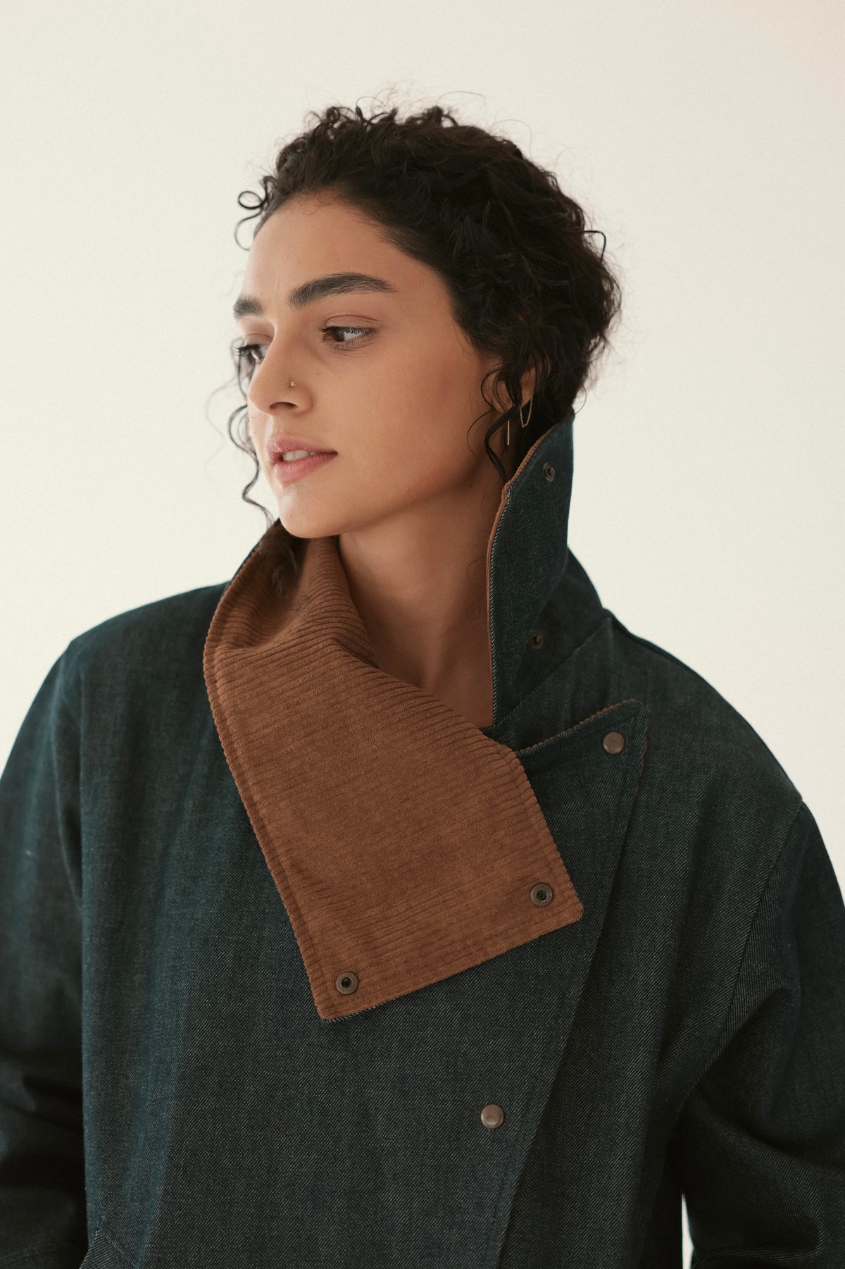 Denim jacket with brown collar detail